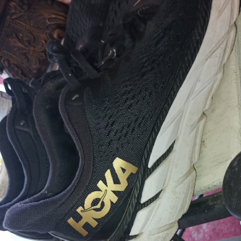 HOKA Black and Gold Running Shoes